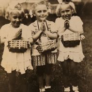 Taking_part_in_a_Catholic_ceremony_I_am_in_the_middle,_Piszczac,_Poland,_1943.JPG