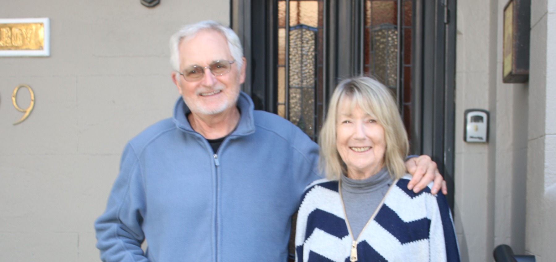David and Sharman outside their heritage home with solar in Bondi