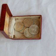 Original_silver_50c_coins_for_Redemption_of_first_born_male._Minted_late_1960s,_collected_by_mother_mother.JPG