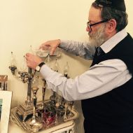 Velvel_Lederman_lighting_the_Shabbat_candles_a_special_family_tradition_2015.jpg
