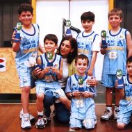 Winning_grand_final_basketball_1999._I_was_coach_Simon_standing_up_far_left_2.jpg