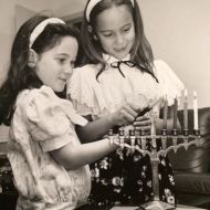 Vic_Alhadeffs_daughters_Michal_and_Daniella_light_the_Chanukah_candelabra_1990.jpg