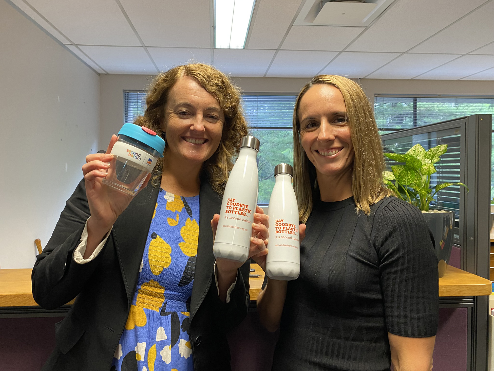 Emily and Marija with reusable drinks containers