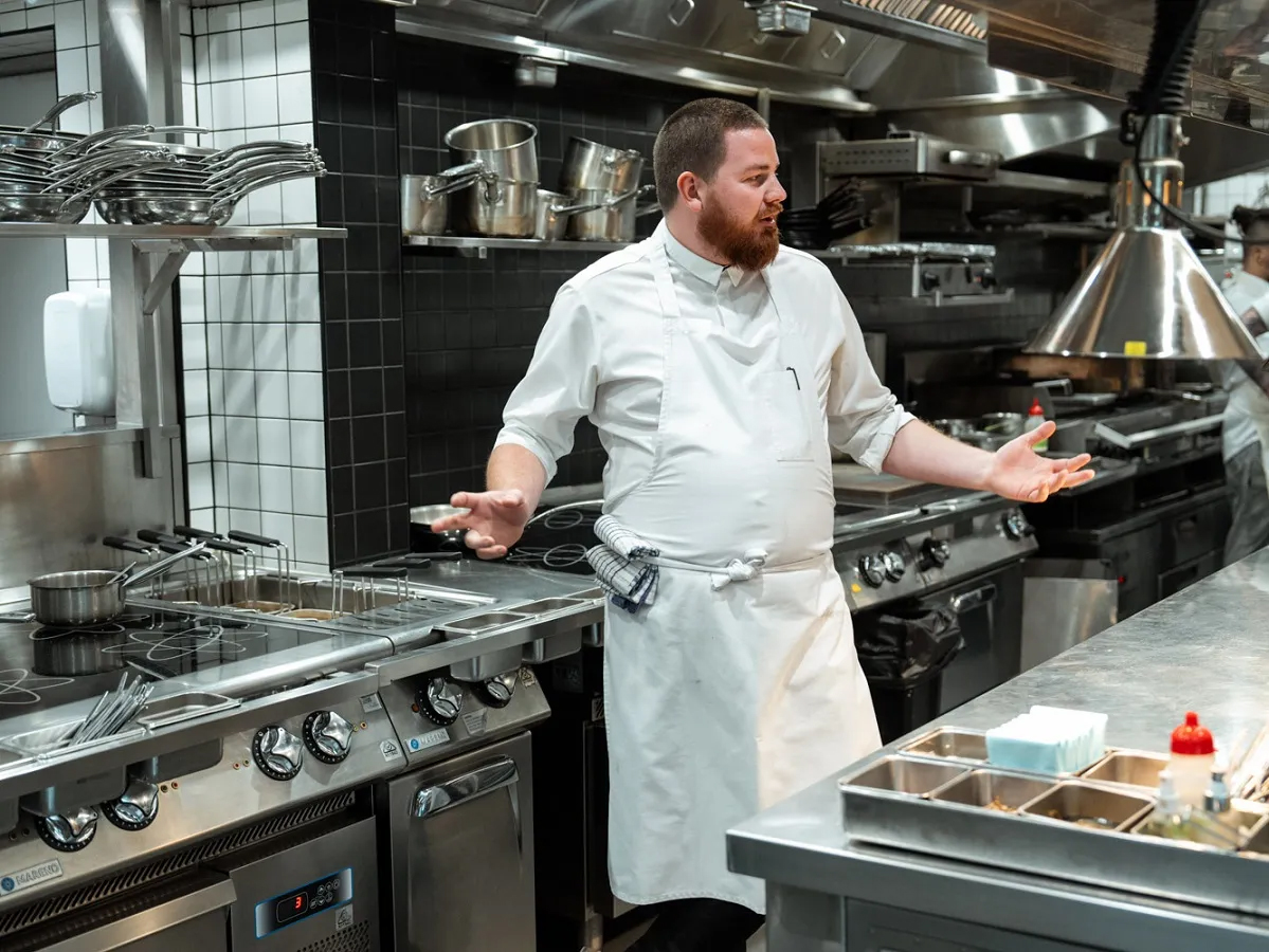 Alex by a induction stove